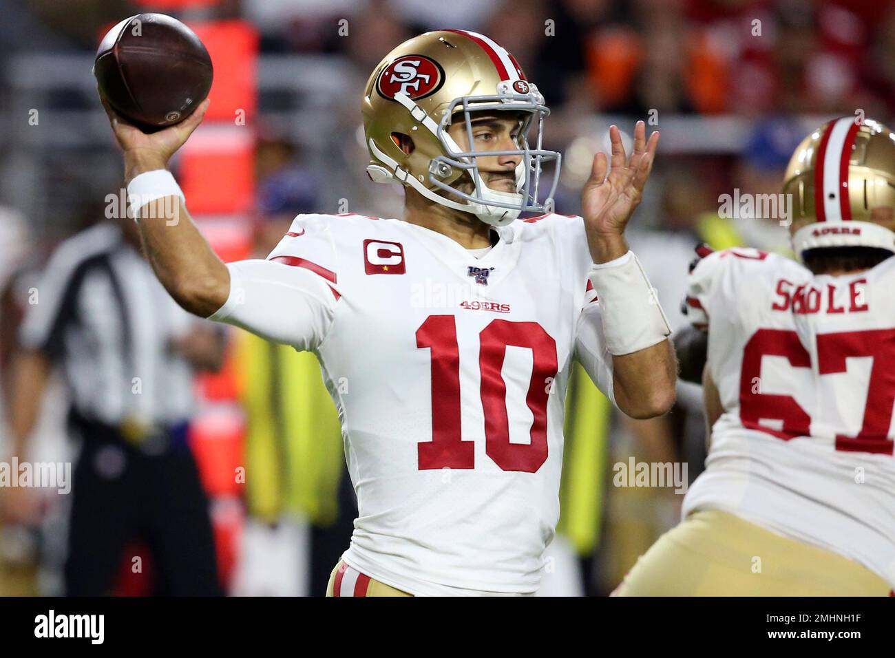 San Francisco 49ers quarterback Jimmy Garoppolo (10) throws against the Arizona Cardinals during the first half of an NFL football game, Thursday, Oct. 31, 2019, in Glendale, Ariz. (AP Photo/Ross D. Franklin) Stock Photo