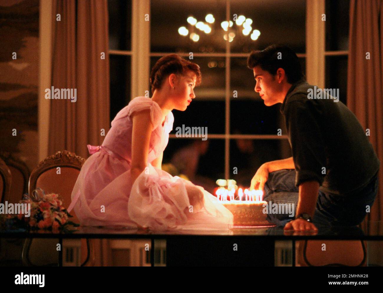 MOLLY RINGWALD and MICHAEL SCHOEFFLING in SIXTEEN CANDLES (1984