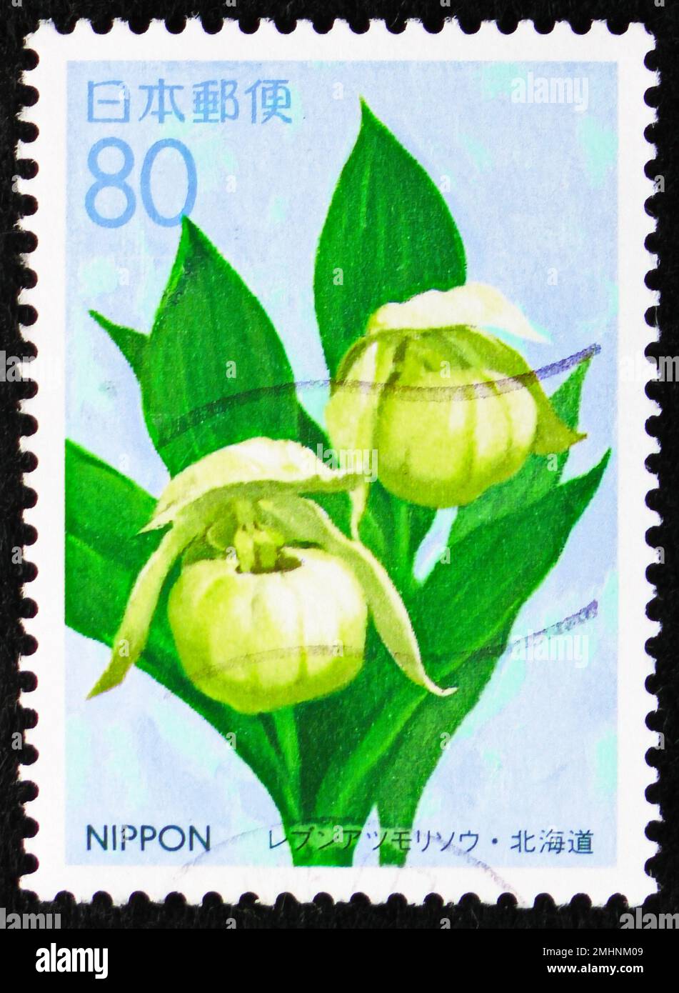 MOSCOW, RUSSIA - DECEMBER 25, 2022: Postage stamp printed in Japan shows Lady's Slipper of Rebun Orchid (Cypripedium macranthum), Prefecture Stamps - Stock Photo