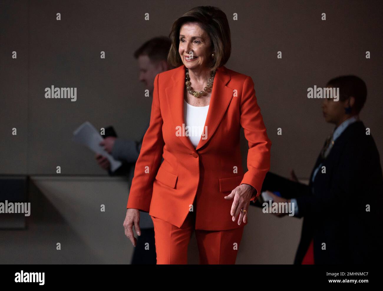 Speaker of the House Nancy Pelosi, D-Calif., arrives to talk to reporters just before the House vote on a resolution to formalize the impeachment investigation of President Donald Trump, in Washington, Thursday, Oct. 31, 2019. (AP Photo/J. Scott Applewhite) Stock Photo