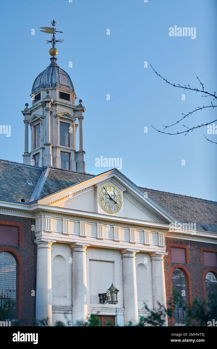 Clock and tower above the main entrance to Royal Chelsea Hospital, London, England, founded by king Charles II for retired soldiers. Stock Photo