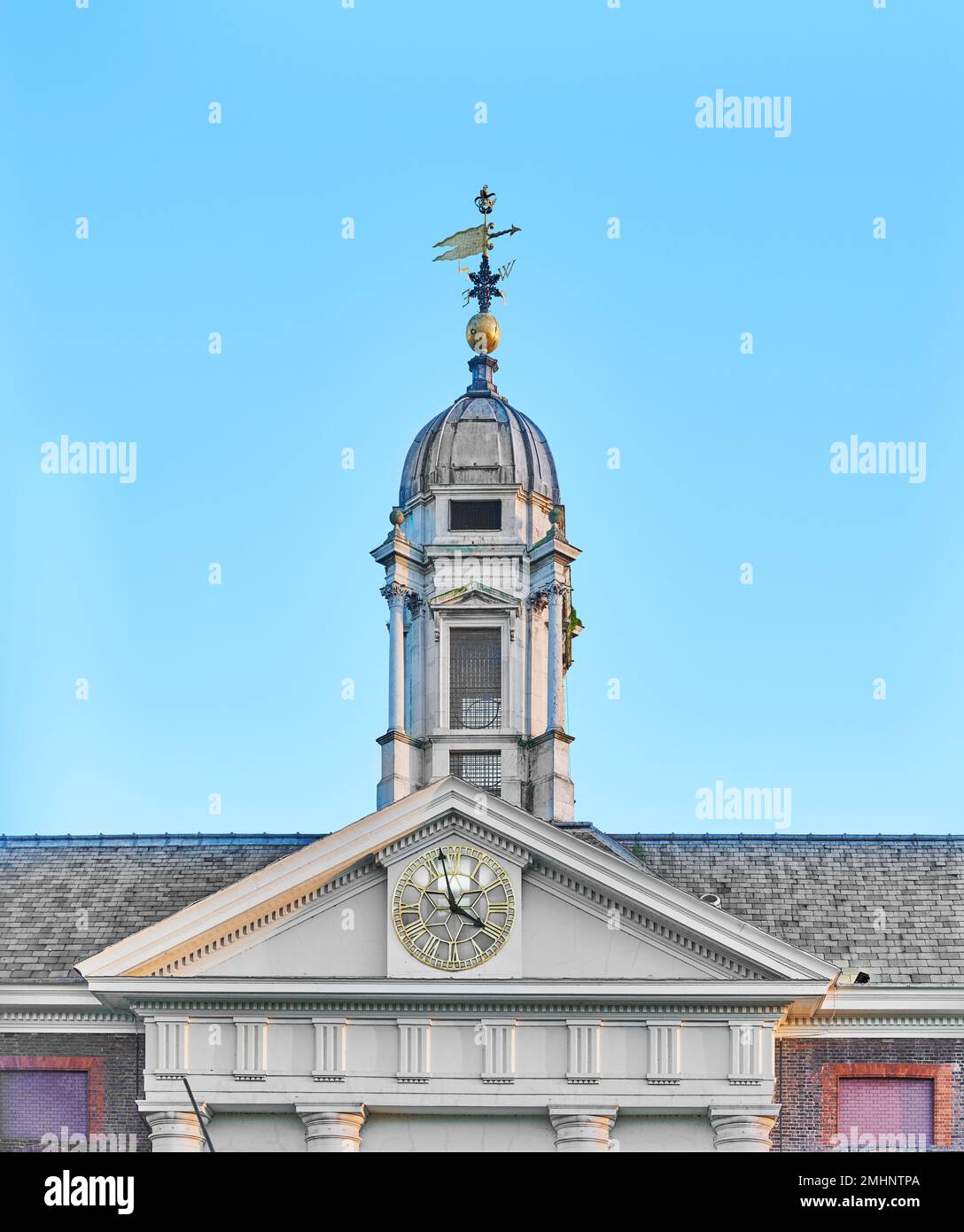 Clock and tower above the main entrance to Royal Chelsea Hospital, London, England, founded by king Charles II for retired military. Stock Photo