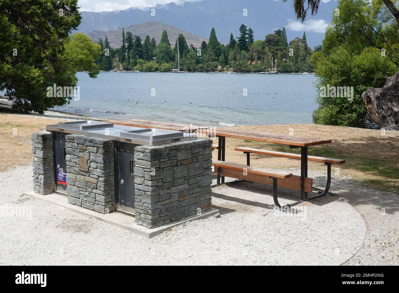 Public BBQ Saint Omer Park, on the shores of Lake Wakatipu Queenstown, New Zealand Stock Photo