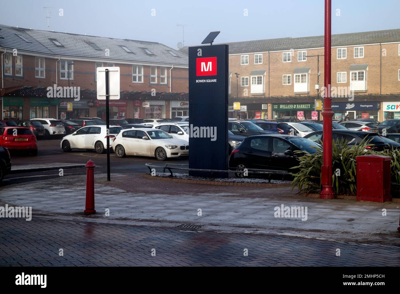 Bowen Square shops and car park in winter, Daventry, Northamptonshire, England, UK Stock Photo