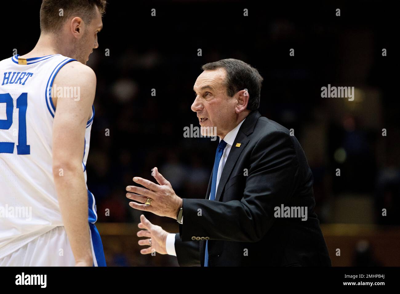 Duke head coach Mike Krzyzewski, right, speaks with Duke's Matthew Hurt