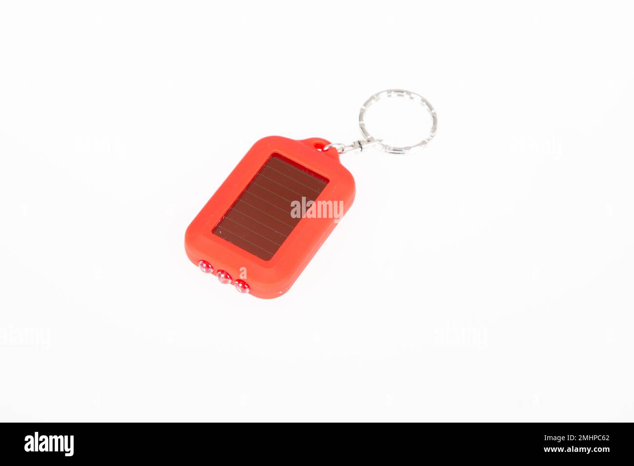 Solar powered LED keychain red plastic flashlight Stock Photo Alamy