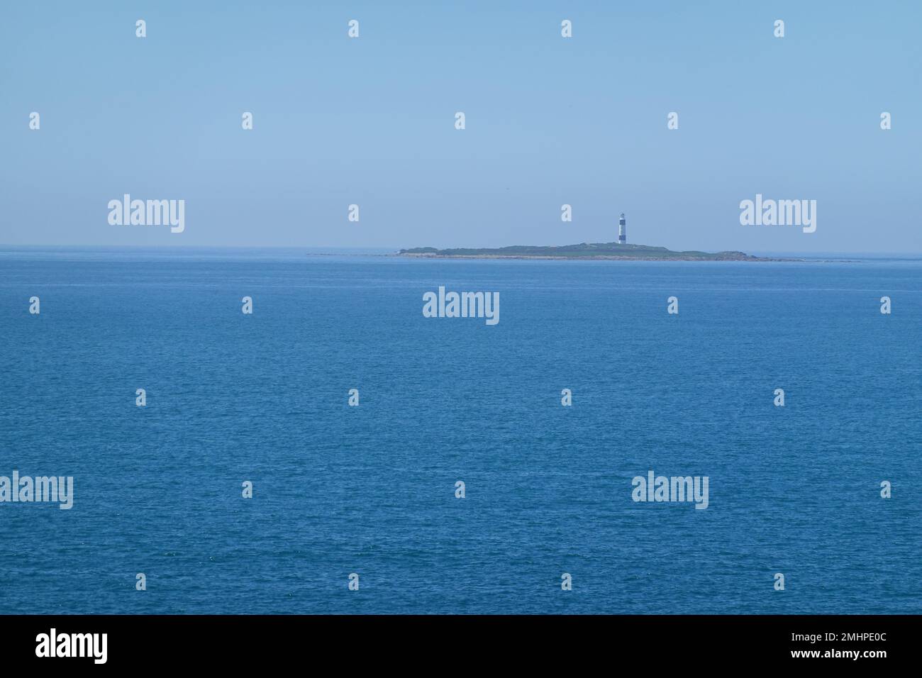 Dog Island lighthouse seen from the Bluff Hill Scenic reserve, across