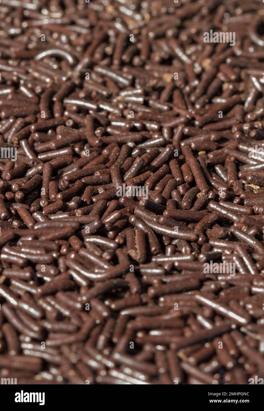 Chocolate sprinkles texture, food background Stock Photo Alamy
