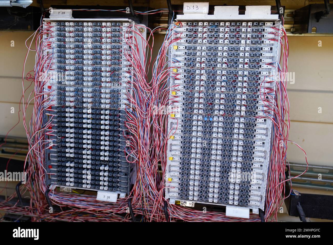Landline telephone wires in a junction fiber network street box Stock
