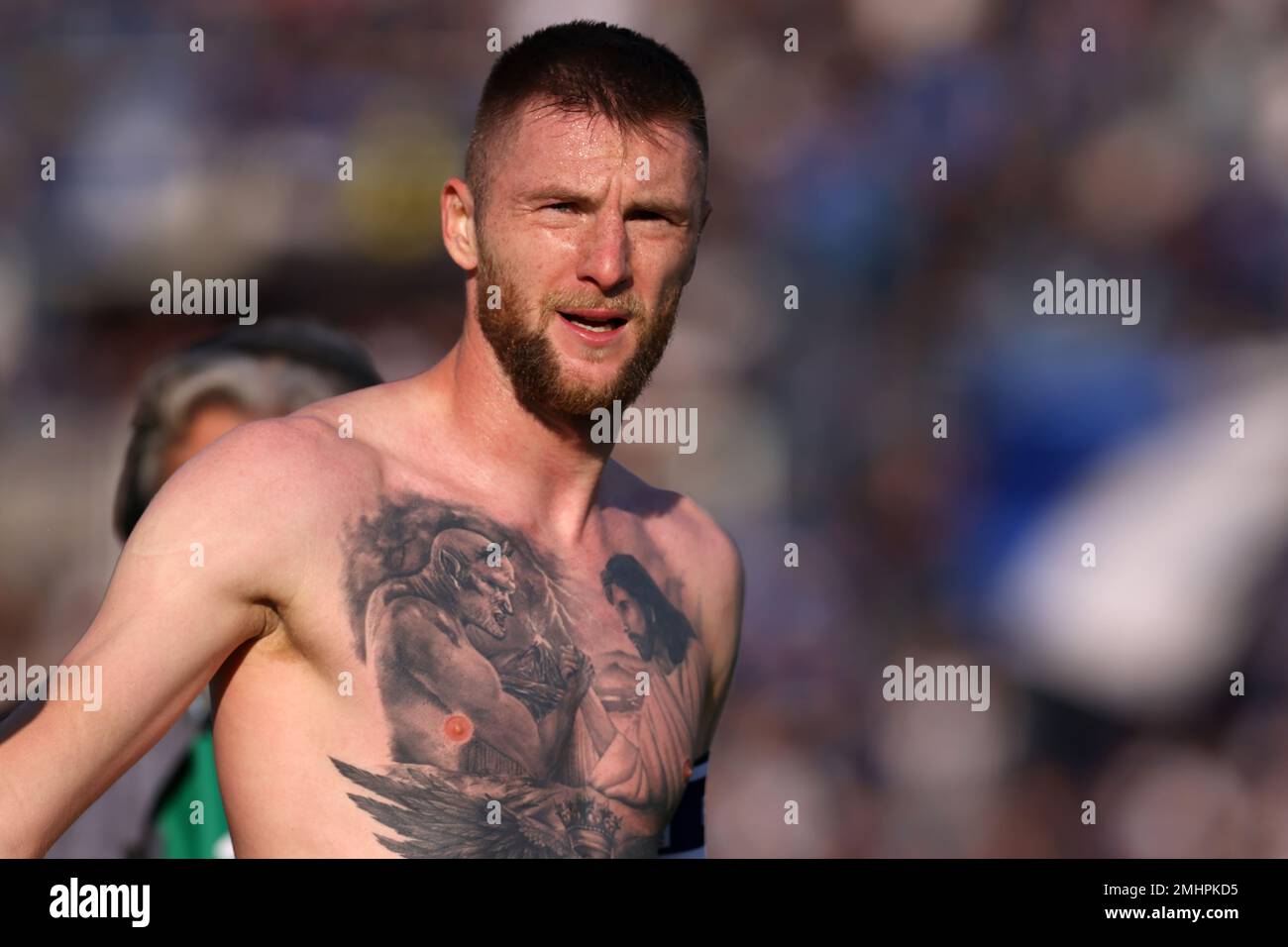Bergamo, Italy, 13th November 2022. Milan Skriniar of FC Internazionale looks on after removing his jersey revealing a chest tattoo of Lucifer and Jesus Christ following the final whistle of the Serie A match at Gewiss Stadium, Bergamo. Picture credit should read: Jonathan Moscrop / Sportimage Stock Photo