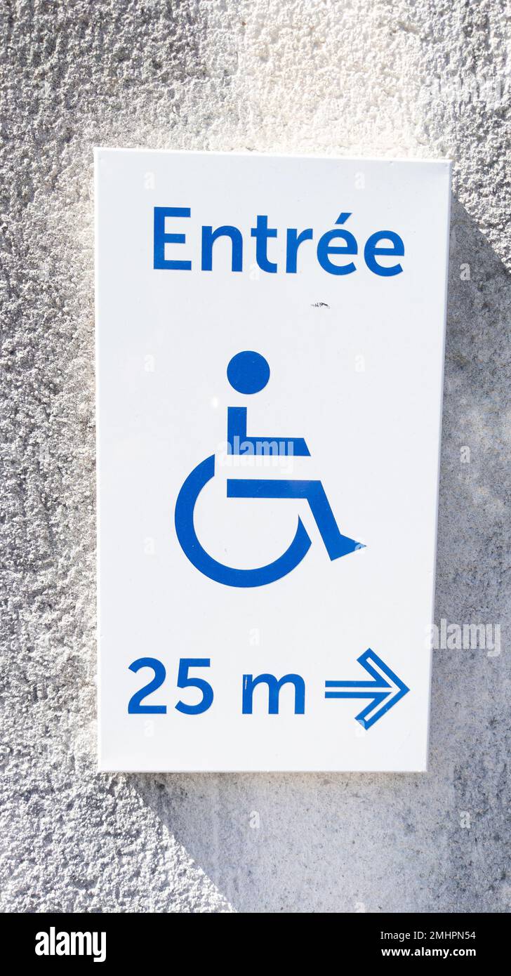 disabled accessible entree french text means entry sign posting with
