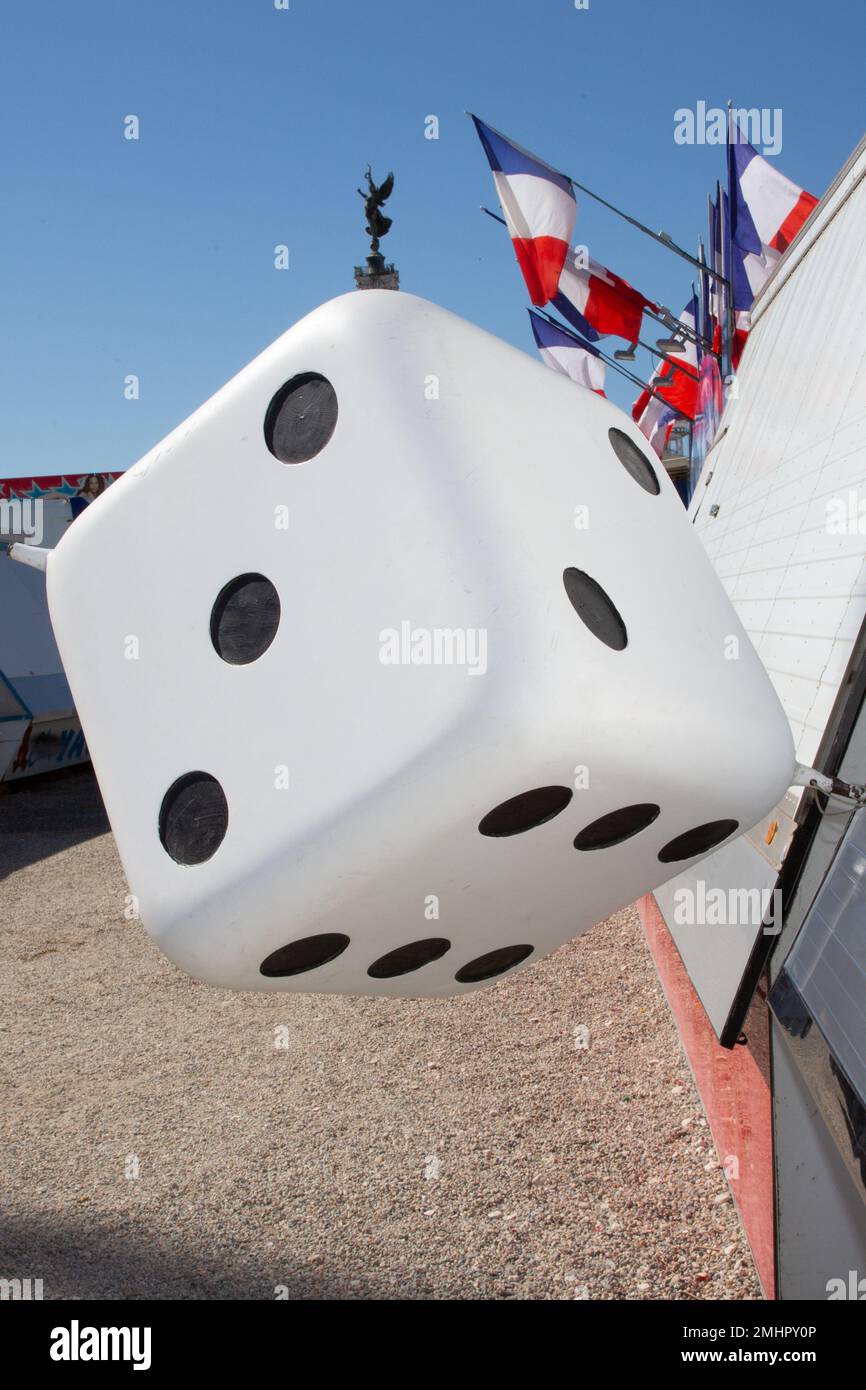 White big dice giant sign front of toy games toys store signage and