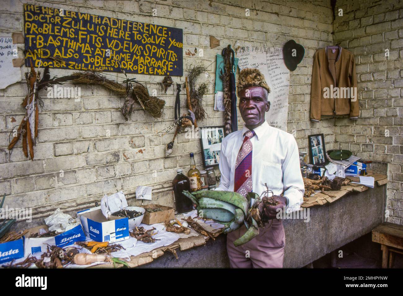 Zambia, a herbalist offers his herbal plants on a market in Lusaka. Stock Photo