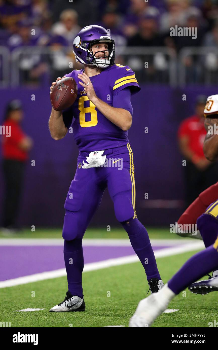 Washington Redskins quarterback Kirk Cousins looks to pass against