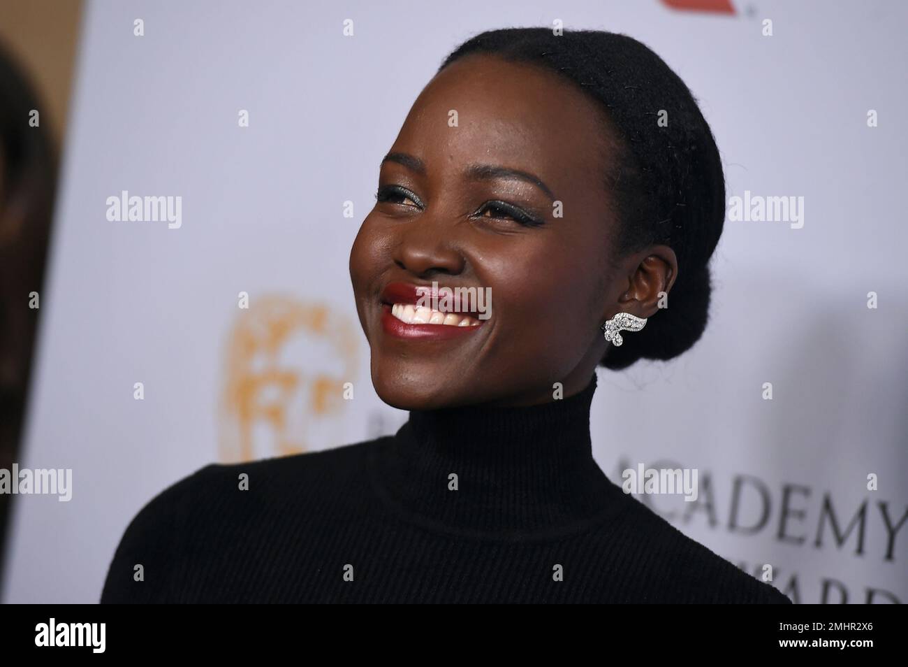 Lupita Nyong'o arrives at the BAFTA Los Angeles Britannia Awards at the