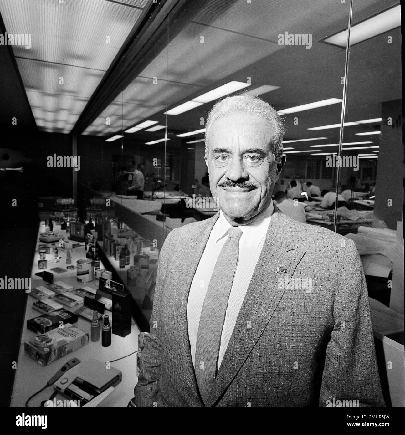 Raymond Loewy, one of the world's renowned industrial designers, poses