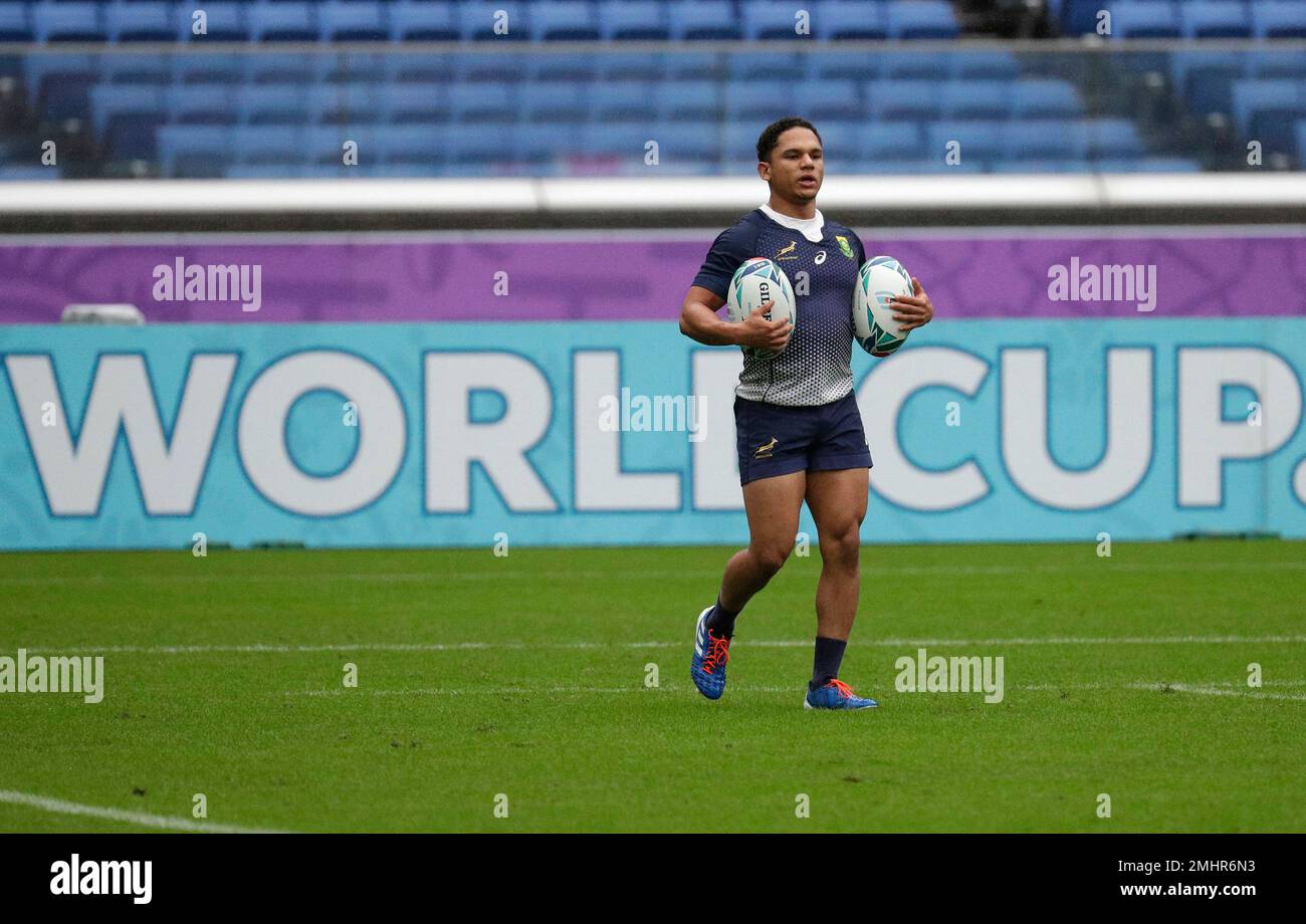South Africa's Herschel Jantjies holds balls during training at the
