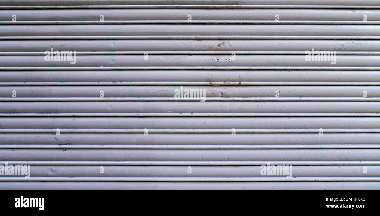 grey entry store metal curtain texture surface gray door galvanize steel background silver industrial portal Stock Photo