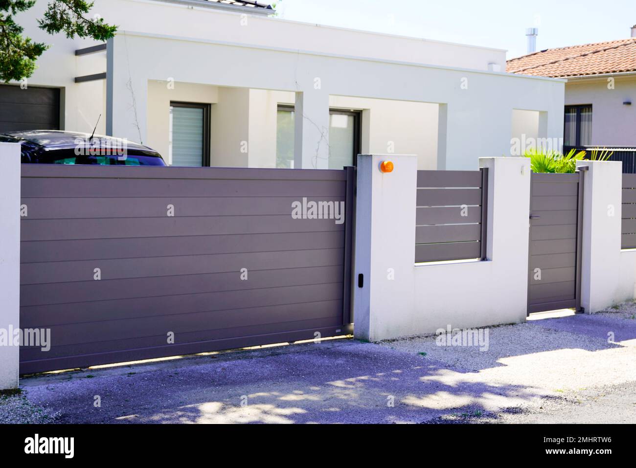 street suburb home grey brown dark metal aluminum house gate slats garden access door Stock ...
