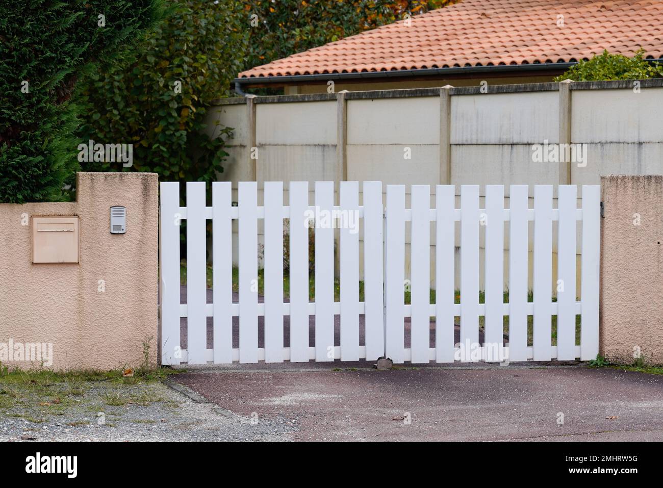 White PVC gate slide garden door and family home house Stock Photo