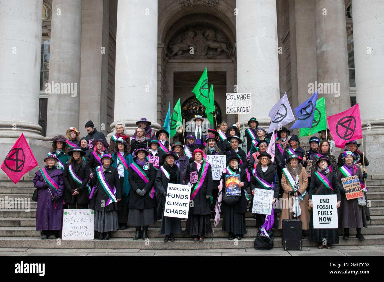 London, England, UK 27 January 2023 Women dressed as suffragettes march from the Bank of England to Southwark Crown Court in solidarity with the 7 women found guilty of criminal damage for smashing the windows of Barclays Bank in April 2021. The protesters were joined by Gail Bradbrook, Helen Pankhurst and actress Juliet Lewis Credit: Denise Laura Baker/Alamy Live News Stock Photo