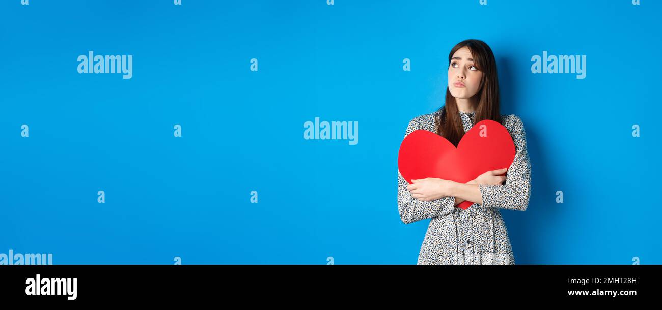 sad woman crying, looking aside on black background, closeup portrait,  profile view Stock Photo - Alamy