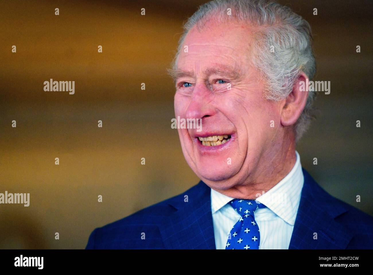 King Charles III talks with genocide survivors after lighting a candle to mark Holocaust Memorial Day at Buckingham Palace, London. Picture date: Friday January 27, 2023. Stock Photo