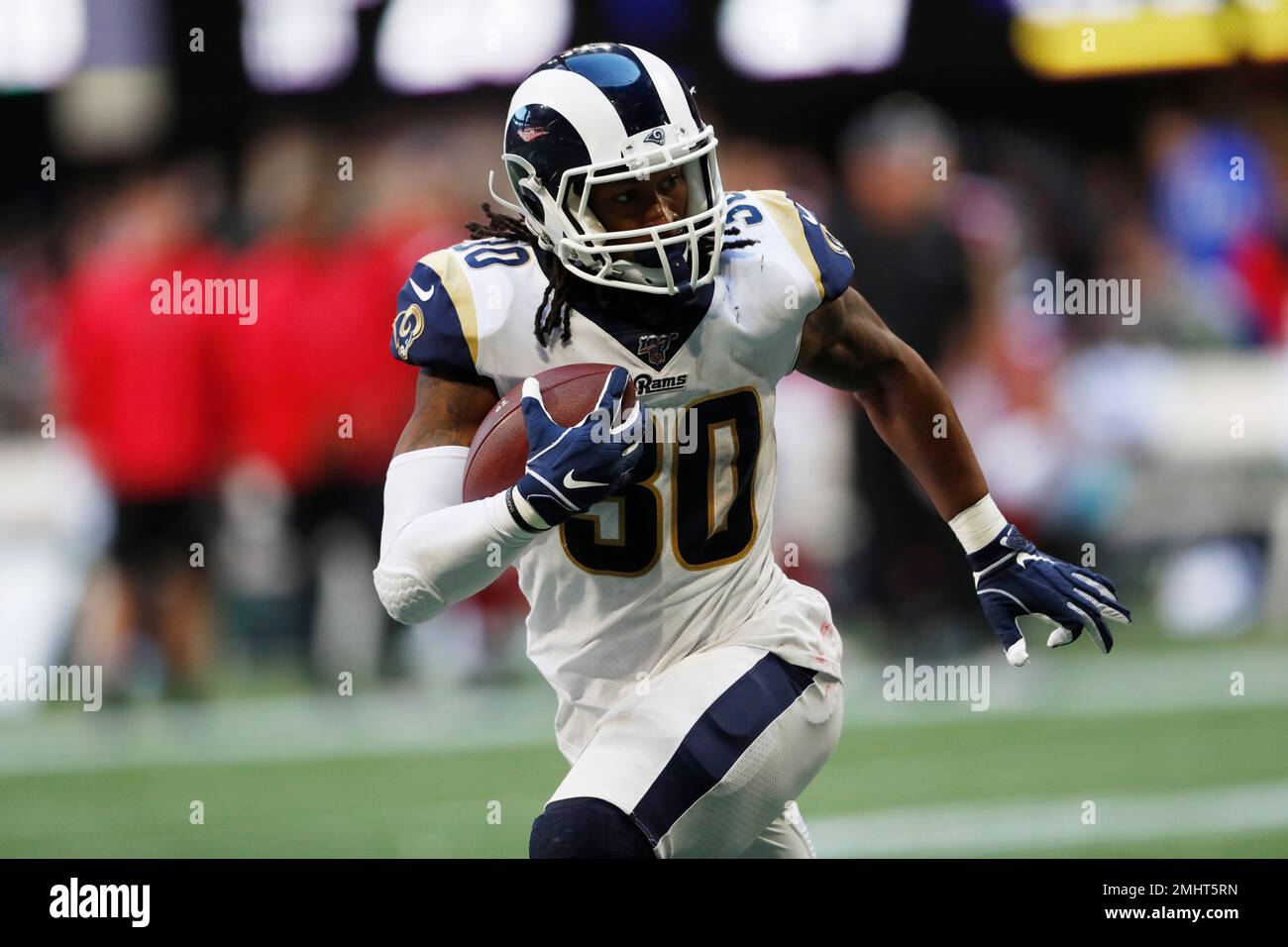Los Angeles Rams running back Todd Gurley (30) runs against the Atlanta  Falcons during the second half of an NFL football game, Sunday, Oct. 20,  2019, in Atlanta. (AP Photo/John Bazemore Stock
