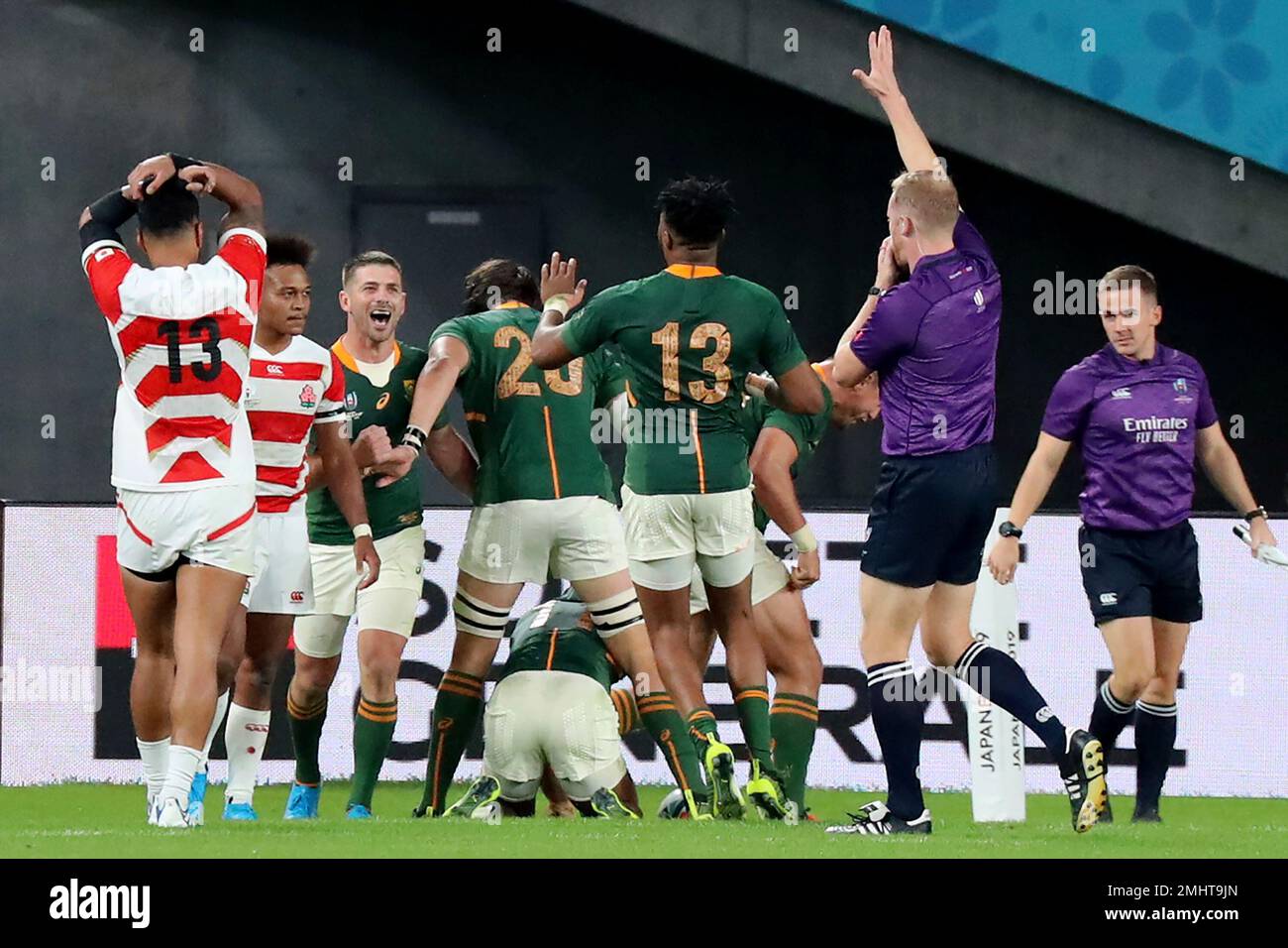 South Africa players celebrate as South Africa's Makazole Mapimpi