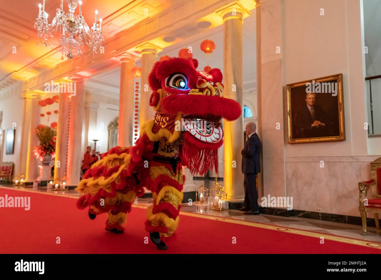Washington, United States Of America. 26th Jan, 2023. Washington, United States of America. 26 January, 2023. Traditional Chinese lion costumed performers dance down the Cross Hall on the way to a reception to celebrate the Lunar New Year in the East Room of the White House, January 26, 2023 in Washington, DC President Biden hosted the first-ever Lunar New Year reception at the White House. Credit: Carlos Fyfe/White House Photo/Alamy Live News Stock Photo