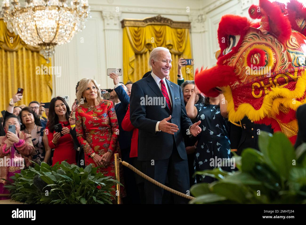 Washington, United States Of America. 26th Jan, 2023. Washington, United States of America. 26 January, 2023. U.S President Joe Biden reacts to performers wearing a traditional Chinese lion costume during a reception to celebrate the Lunar New Year in the East Room of the White House, January 26, 2023 in Washington, DC Biden hosted the first-ever Lunar New Year reception at the White House. Credit: Katie Ricks/White House Photo/Alamy Live News Stock Photo