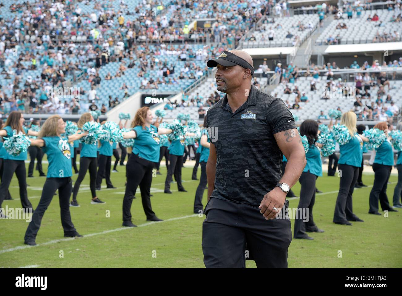 Former Jacksonville Jaguars player Donovin Darius is honored on the