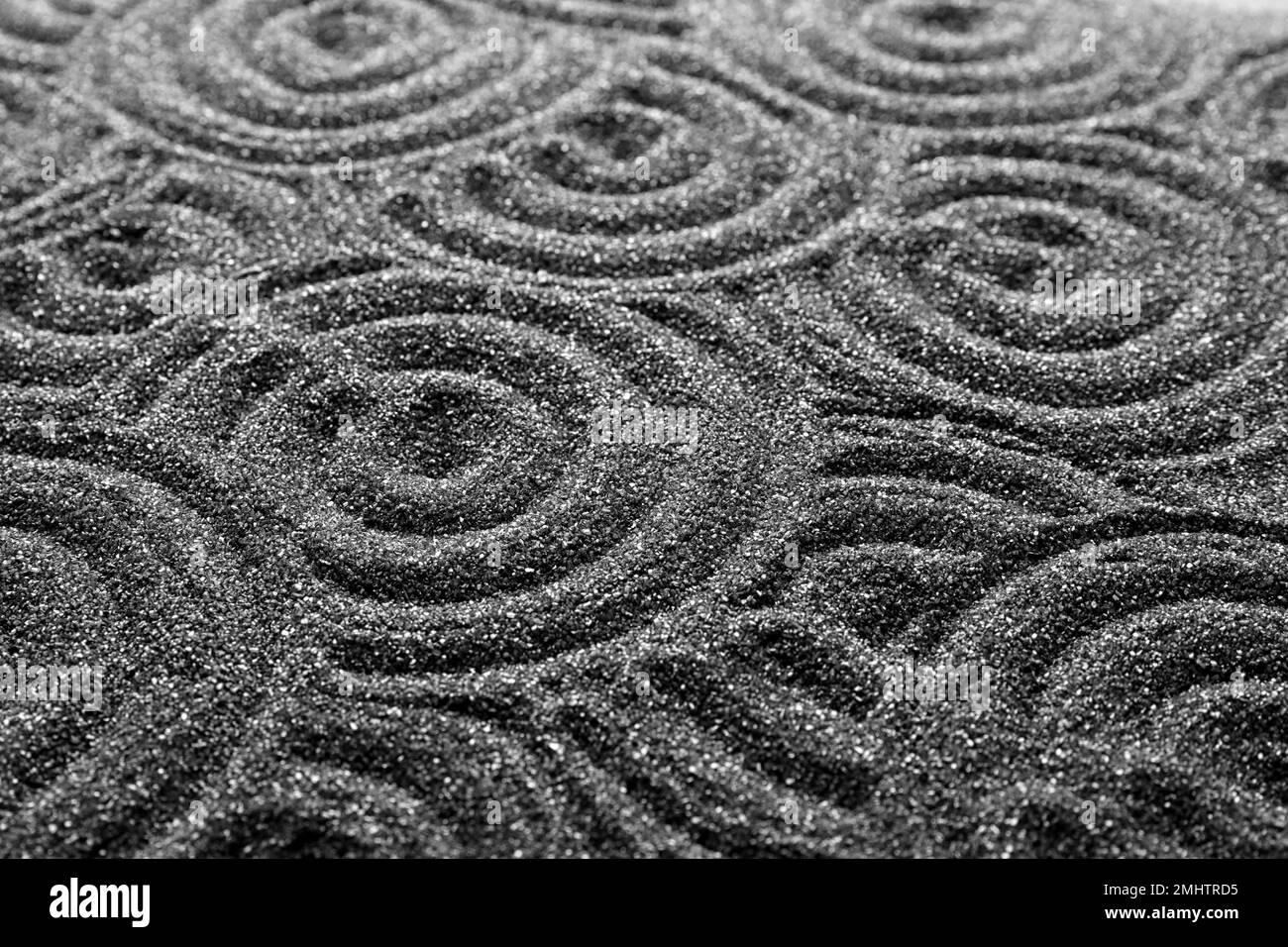 Pattern on decorative black sand, closeup. Zen and harmony Stock Photo ...