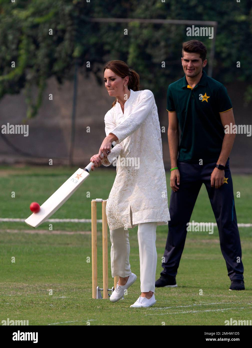 Britain's Kate, Duchess of Cambridge, bats as Pakistani cricketer