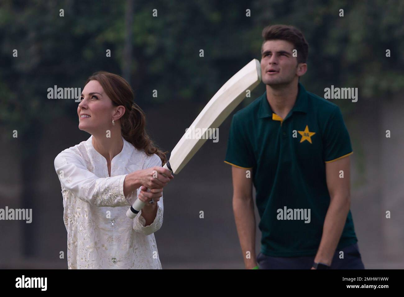 Britain's Kate, Duchess of Cambridge bats as Pakistani cricketer