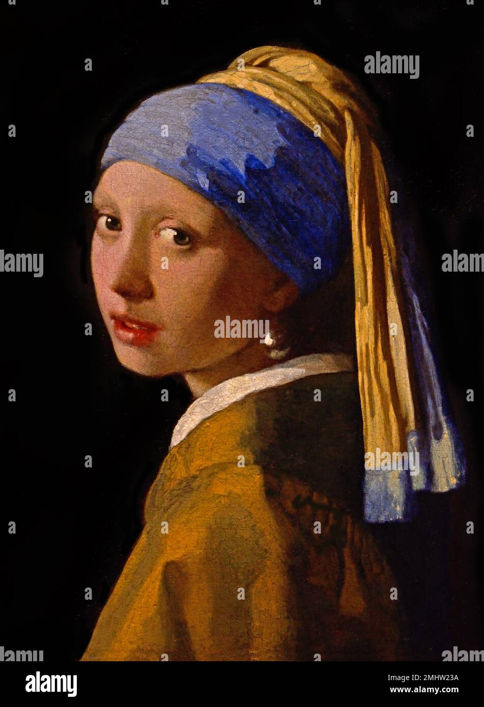 Girl with Pearl Earring 1665 by Johannes Vermeer or Jan Vermeer 1632 - 1675, The Netherlands, Dutch, Holland, Girl in exotic clothing, with an oriental turban and an incredibly large pearl in her ear. Stock Photo