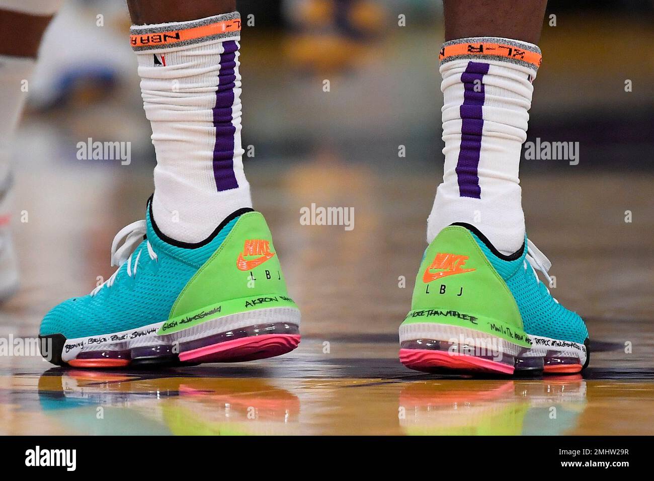 The shoes of Los Angeles Lakers forward LeBron James are seen during the first half of a preseason NBA basketball game against the Golden State Warriors Wednesday Oct. 16 2019 in Los