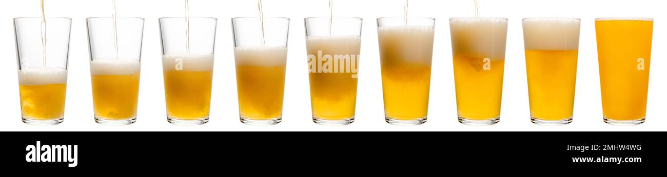 IPA or APA ale beer is pouring into shaker pint glass isolated on a white background Stock Photo