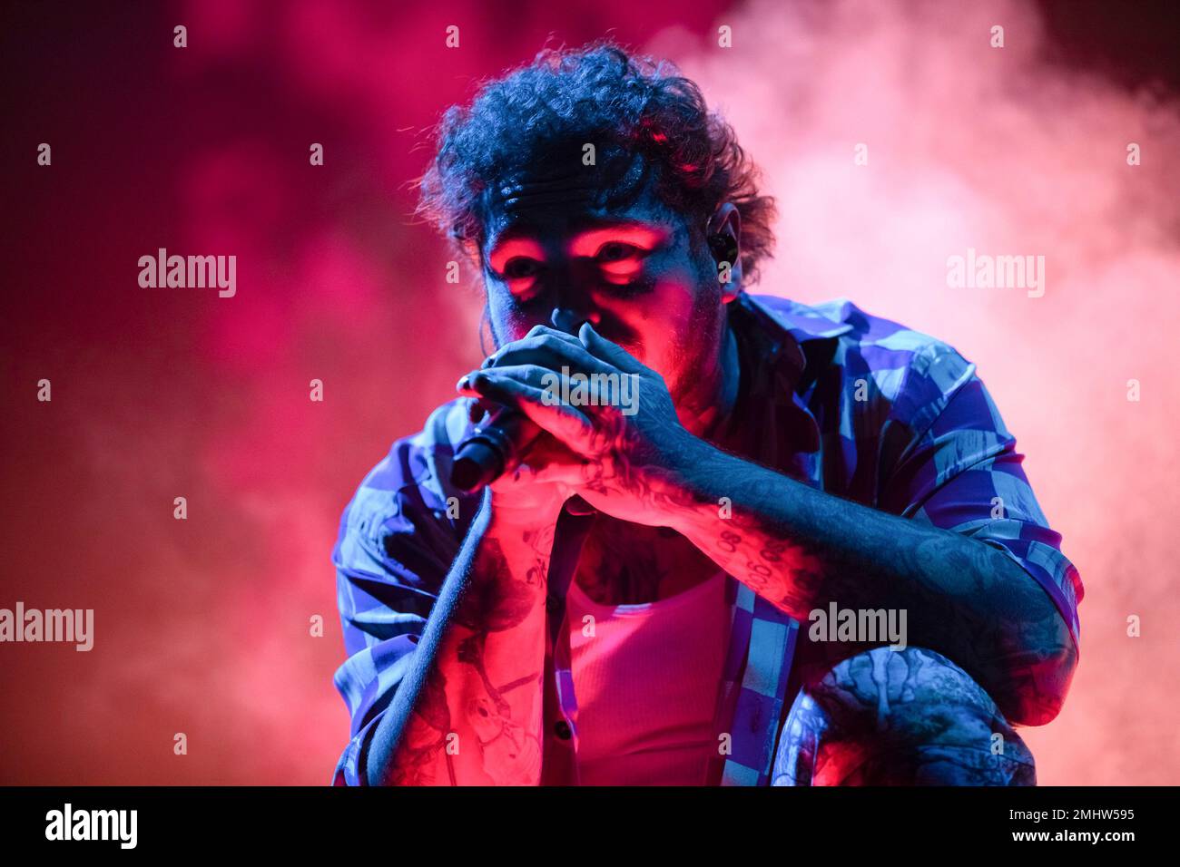 Post Malone performs on stage at the Capitol One arena on Saturday, Oct