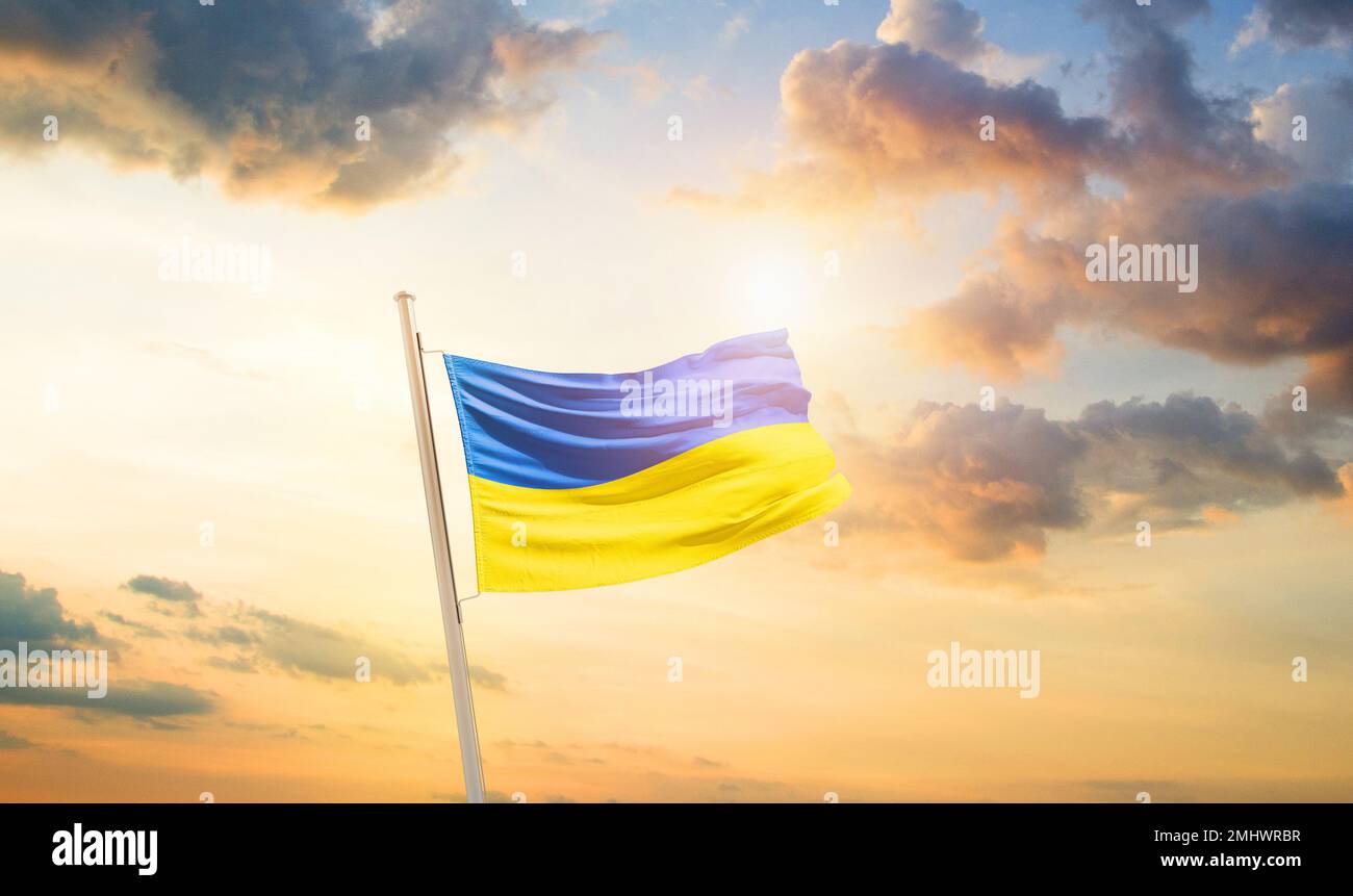 Ukraine national flag waving in beautiful sky Stock Photo Alamy