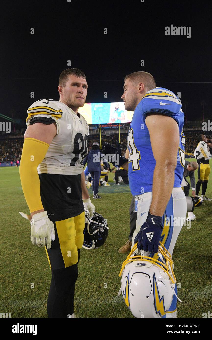 Pittsburgh Steelers outside linebacker T.J. Watt, left, and Los Angeles  Chargers fullback Derek Watt greet each other after an NFL football game,  Sunday, Oct. 13, 2019, in Carson, Calif. (AP Photo/Kyusung Gong