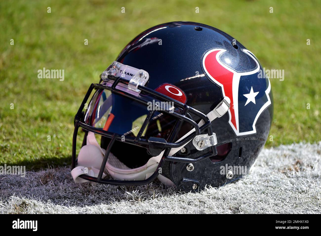 A Houston Texans helmet sits on the sidelines before an NFL