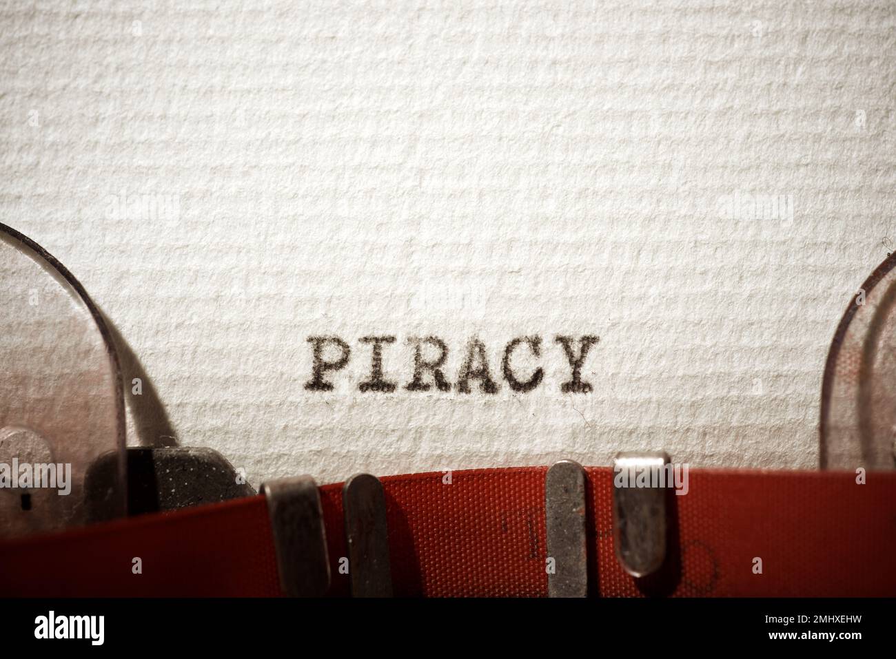 Piracy word written with a typewriter. Stock Photo