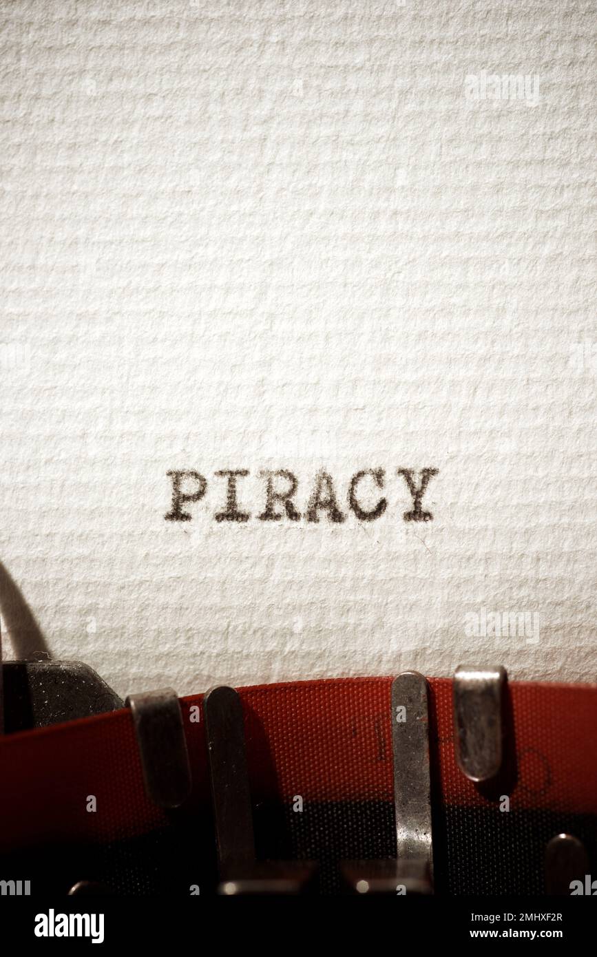 Piracy word written with a typewriter. Stock Photo