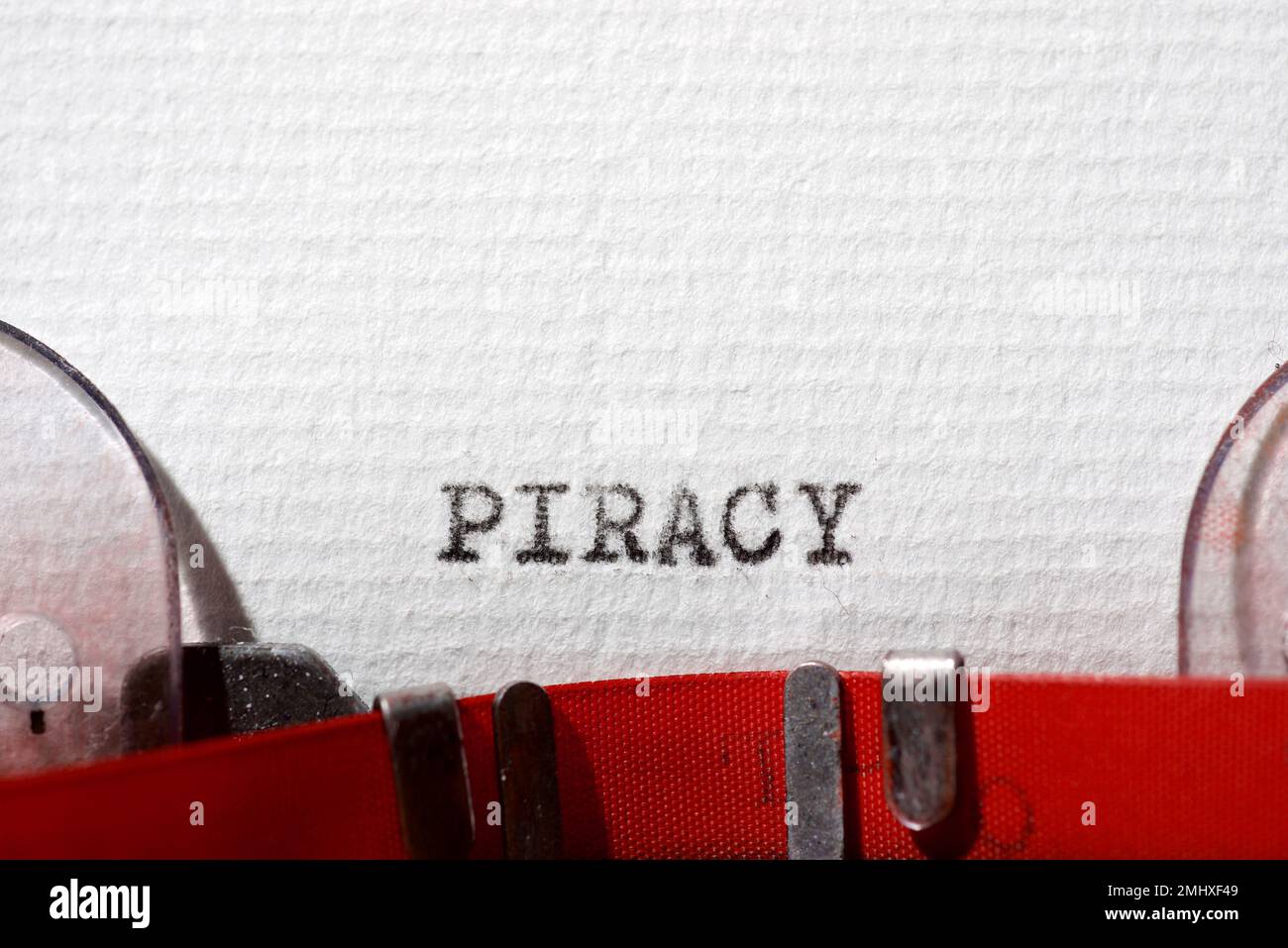 Piracy word written with a typewriter. Stock Photo