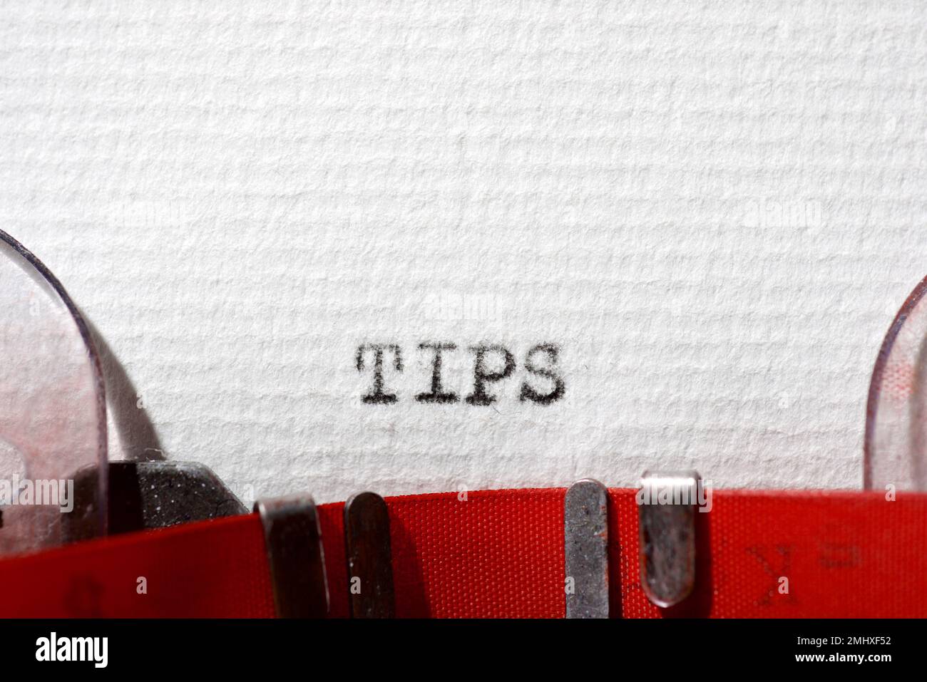 Tips word written with a typewriter. Stock Photo