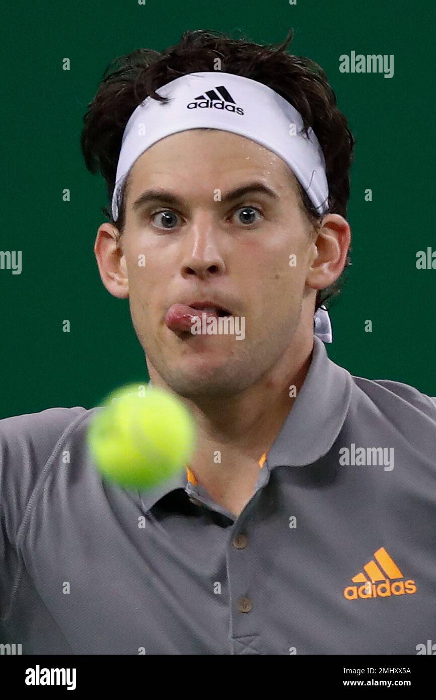 Dominic Thiem of Austria eyes on the ball as he plays against Pablo Carreno Busta of Spain in the mens singles match at the Shanghai Masters tennis tournament at Qizhong Forest Sports