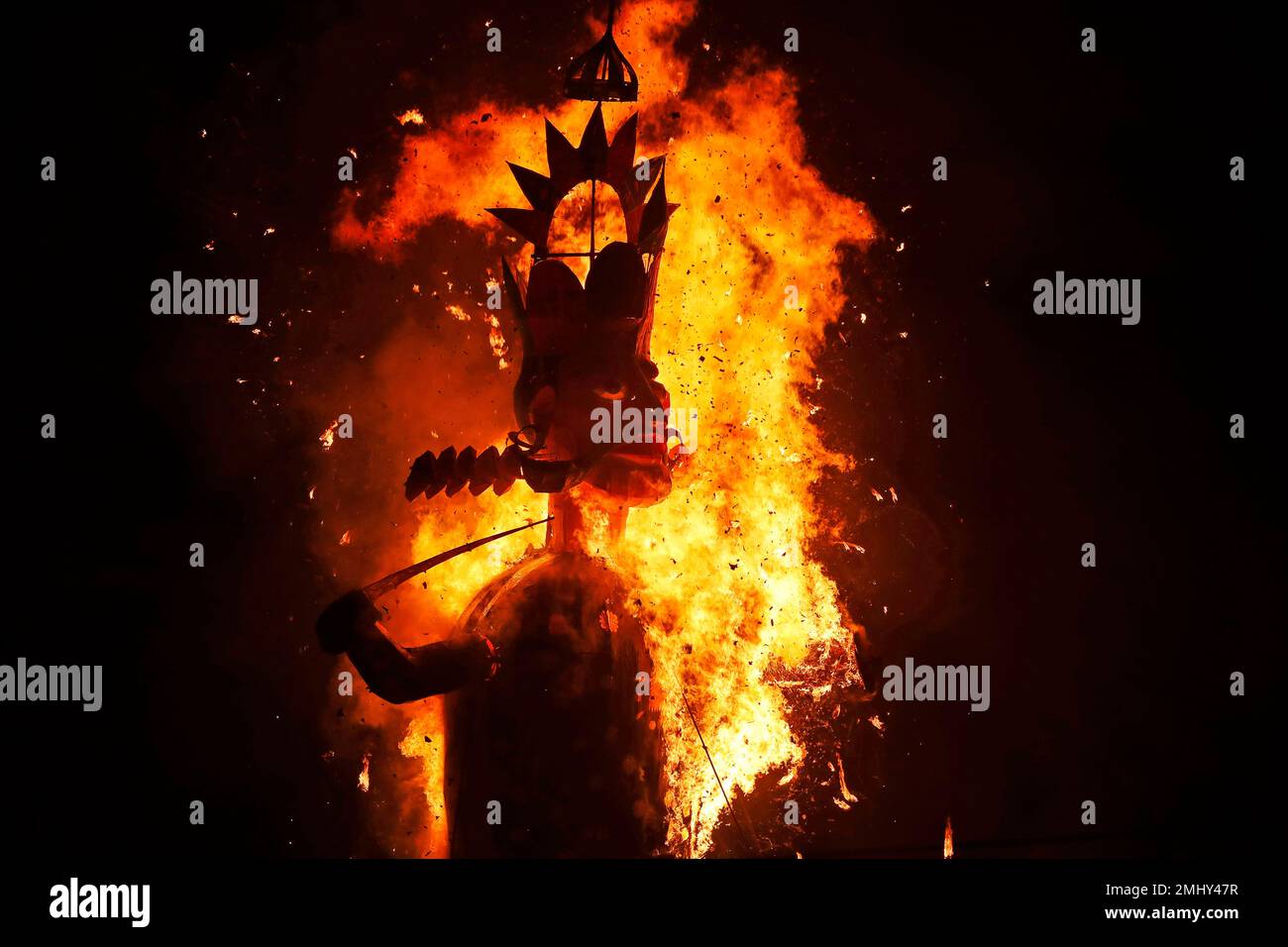 An effigy of mythological demon king Ravana goes up in flames marking ...