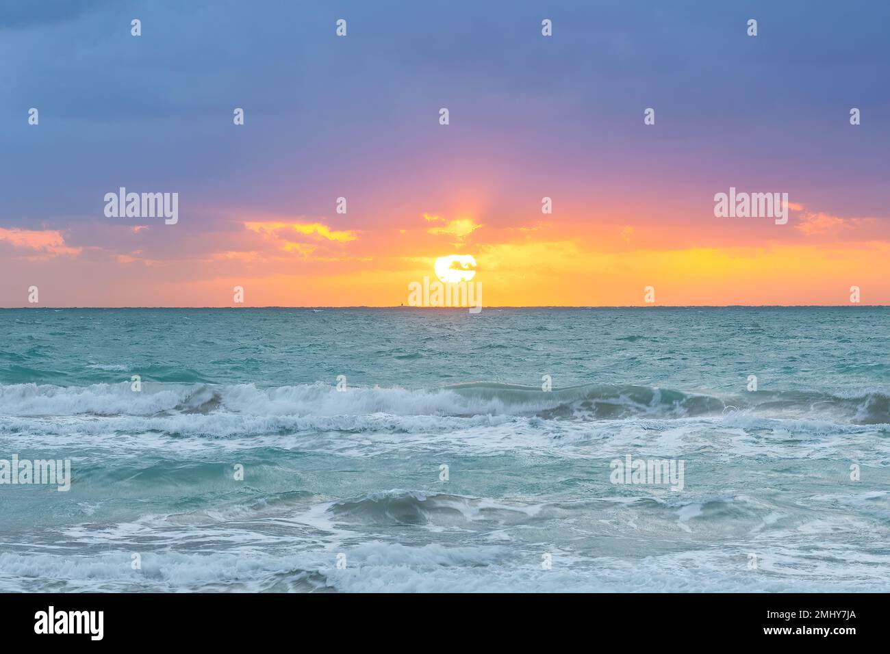 Waves and sunset at South Beach in Miami, United States Stock Photo