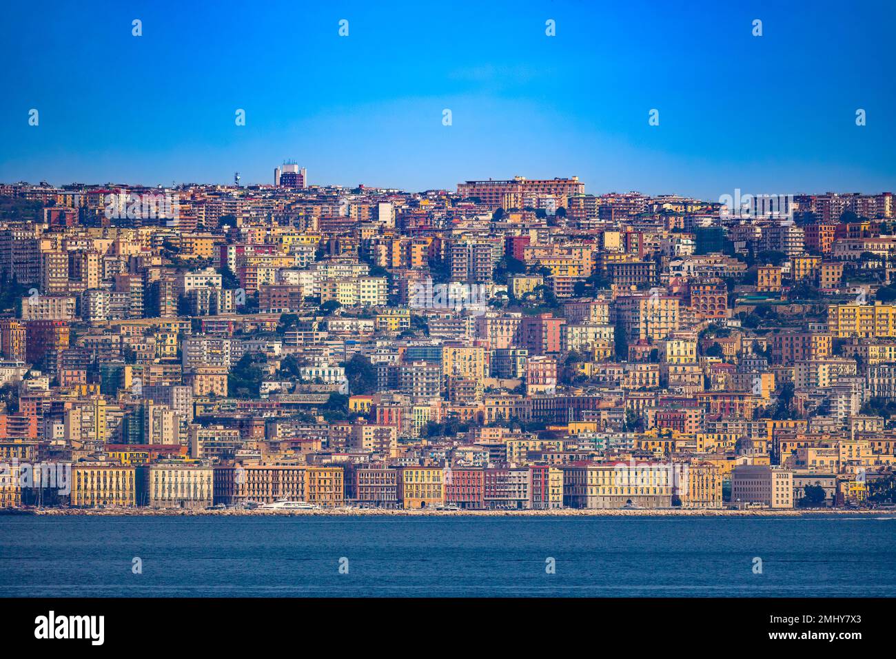 Distant view of buildings of Naples waterfront, Italy Stock Photo